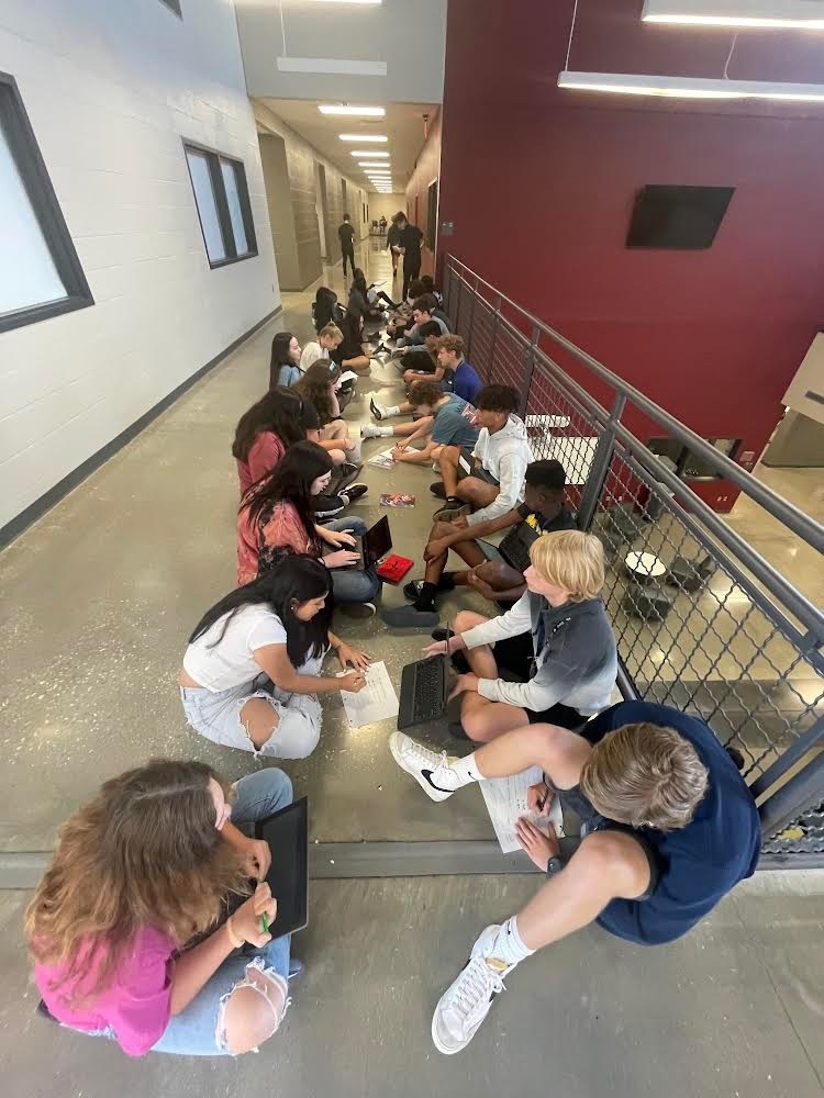 students talking about books
