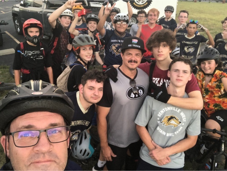 Dr. Guthrie mountain biking with team