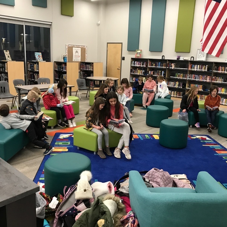 4th Grade & Kinders reading together 
